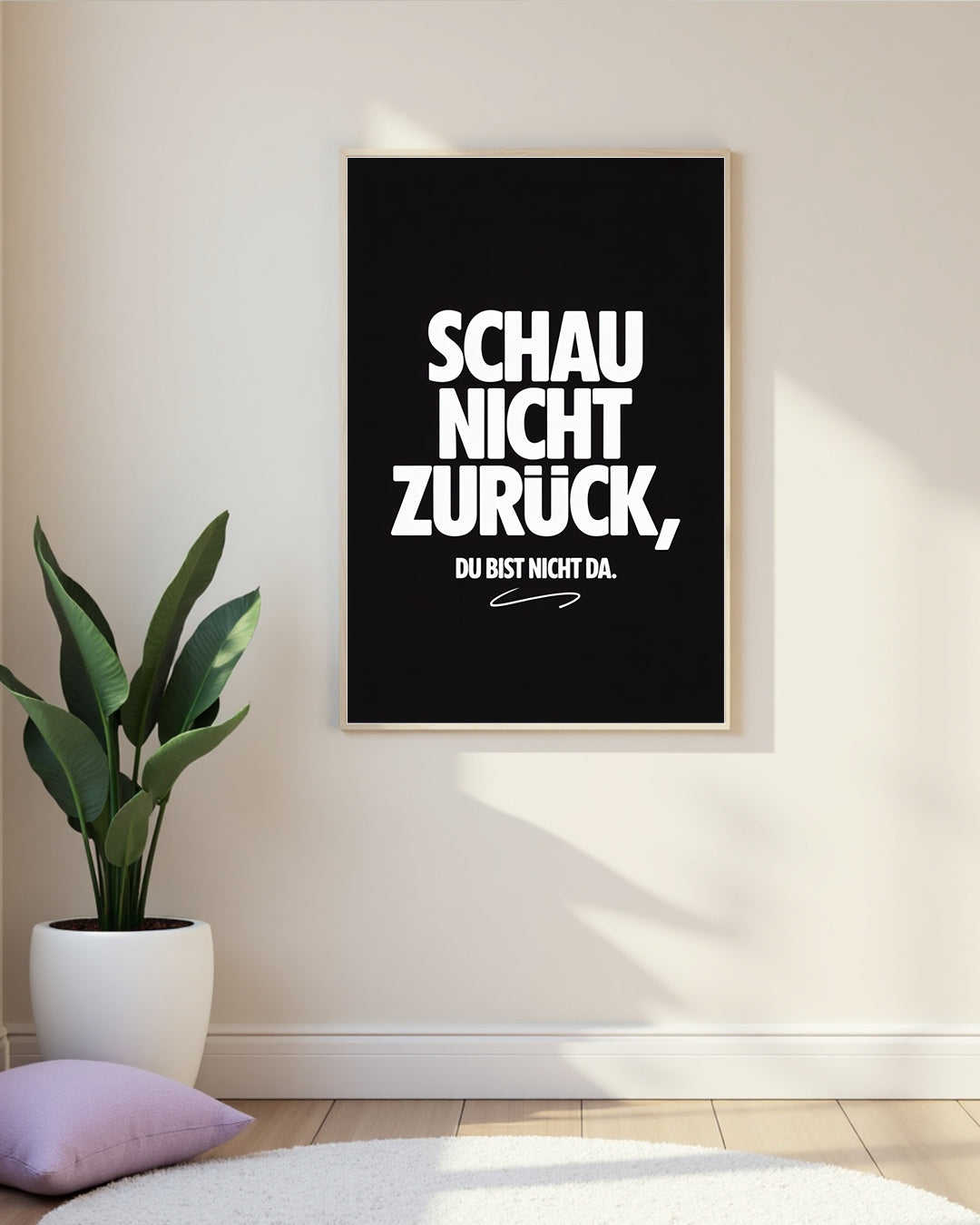 Ästhetisches Motivationsposter in Schwarz mit weißer Typografie, das die Botschaft ‚Schau nicht zurück, du bist nicht da‘ vermittelt und zur positiven Denkweise anregt.